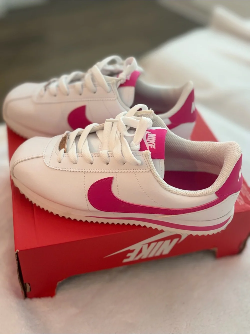 Nike White Sneakers with Pink Swoosh
